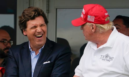 Tucker Carlson with Donald Trump. ‘I hate him passionately,’ Carlson texted.