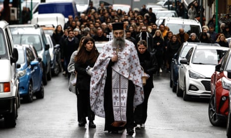 The funeral procession of 23-year old Iphigenia Mitska at Giannitsa , northern Greece, on Saturday.