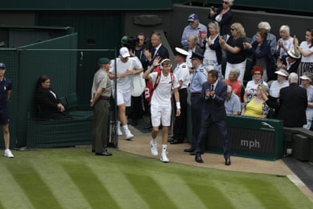 Alexander Bublik walks on to Wimbledon’s Centre Court for his match against Andy Murray in 2017