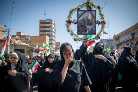 Mourners attend a funeral in Ahvaz for those killed in Israeli strikes