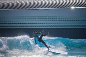 A surfer falls in a pool at Wave Park in Siheung, South Korea