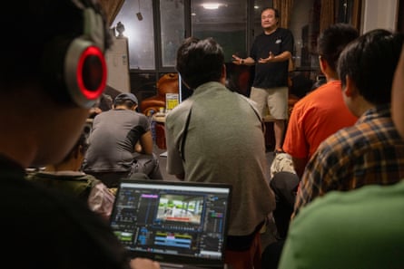 Man talks to film students