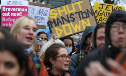 Protesters demonstrate outside the detention centre.