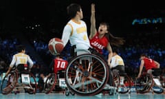 Japan’s Chinami Shimizu attempts to block a move by China’s Guidi Lyu in the wheelchair basketball quarter-final