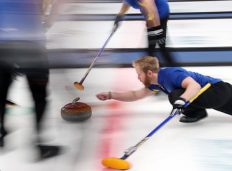 Sweden skip Niklas Edin places a stone during their men’s curling semi-final against Switzerland.