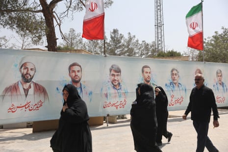 Pictures of Iranian military commanders, nuclear scientists and others killed in Israeli strikes are displayed in Behesht Zahra Cemetery in southern Tehran, Iran, July 11, 2025.