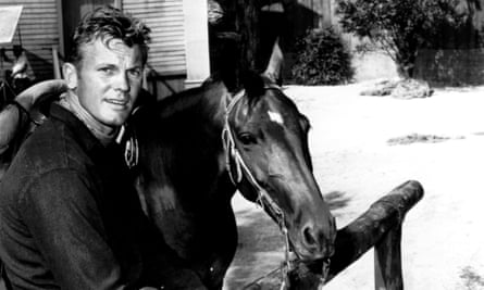 Tab Hunter, who died on Sunday at the age of 86, with his horse on 3 April 1967.