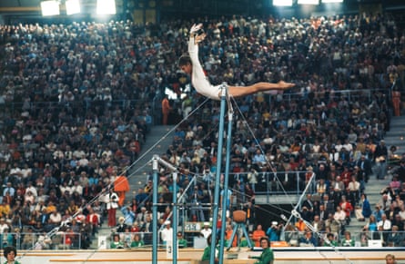 Gymnast Olga Korbut performing on the bars at the 1972 Olympics