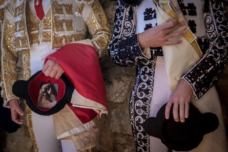 Most of the Spanish bullfighters are catholics. They pray before the fight and sometimes have some religious items with them in the arena