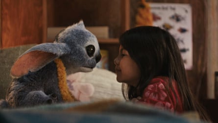 Young girl faces Stitch in film still
