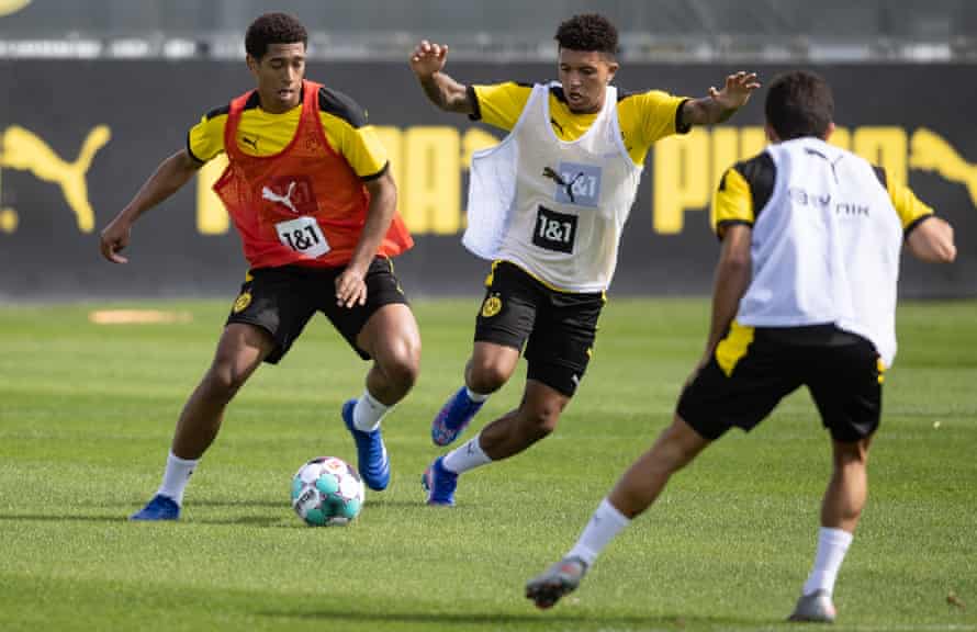 Jude Bellingham and Jadon Sancho contest possession during Dortmund training