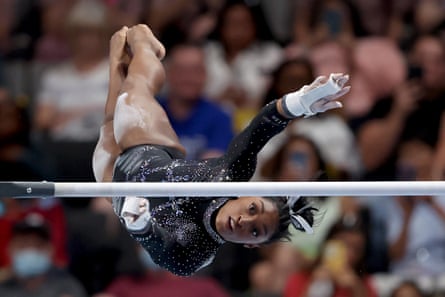 Simone Biles competes on the uneven bars during Sunday’s final day of the US gymnastics championships.