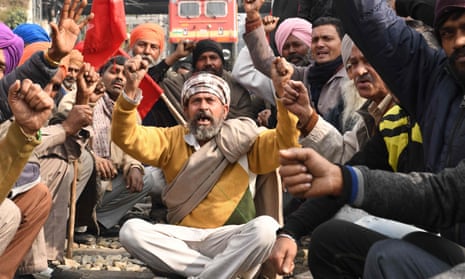 Activists block rail tracks near Amritsar train station.