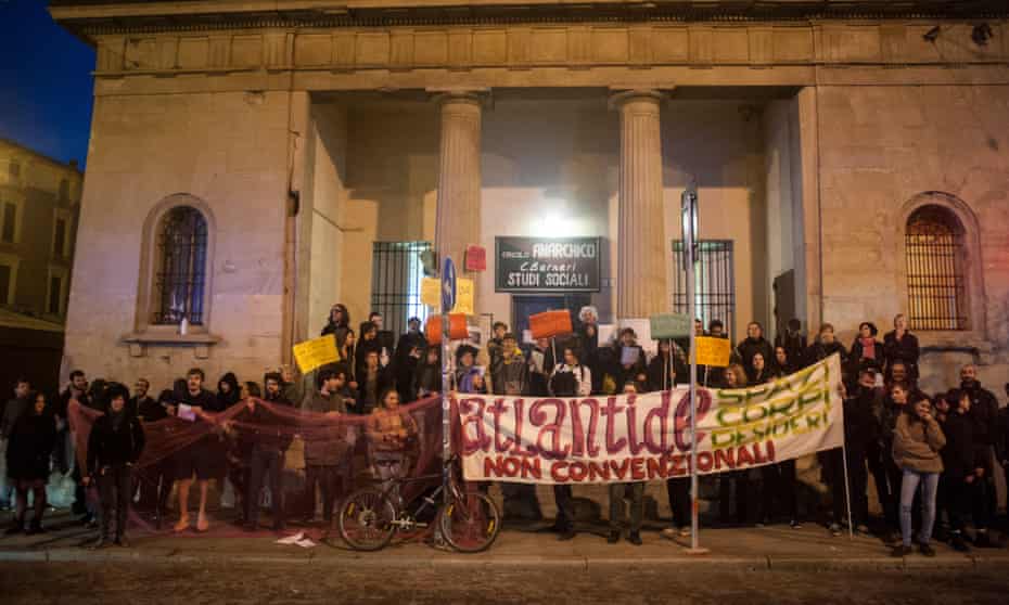 Atlantide’s members gather on the steps of anarchist group Circolo Anarchico Berneri’s premises, just across the road from Atlantide, on the morning of 9 October.