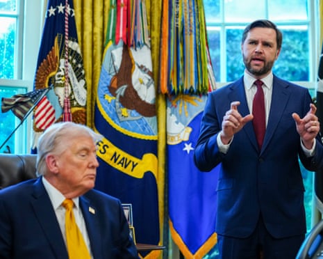 Donald Trump sitting down with JD Vance standing next to him answering questions from media
