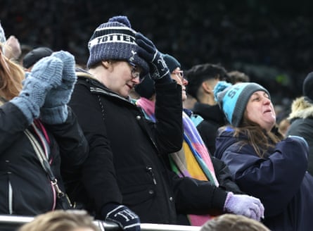 Tottenham fans react during the match against Fulham