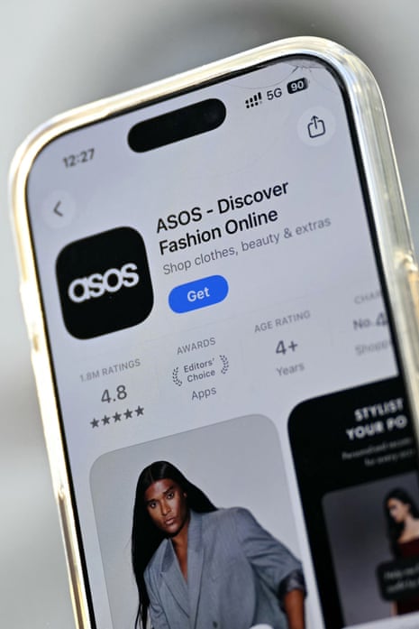 The Asos app is seen ready for download from an app store on an Apple i-phone in London on October 6, 2026.