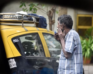 Mumbai, India ‘A taxi driver’s morning ritual in the mirror.’