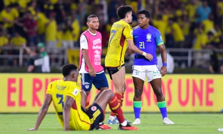 Brazil’s Endrick (right) and Luis Díaz of Colombia hug after the World Cup qualifier in Barranquilla