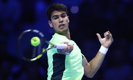 Spain's Carlos Alcaraz hits a forehand.