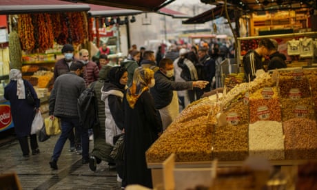A seller talks to clients at the Egyptian bazaar in Istanbul, Turkey, Tuesday, April, 2022. Yearly inflation in Turkey hit 61.14 percent on Monday, climbing to a new 20-year high and deepening a cost of living crisis for many households. The highest yearly price increase was in the transportation sector, at 99.12 percent, while the increase in food prices was 70.33 percent, according to the data. (AP Photo/Francisco Seco)
