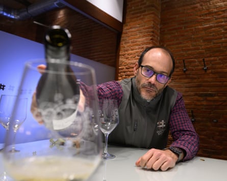 Oenologist Roberto Tello pours a glass of wine at the Cuatro Rayas bodega in La Seca, Valladolid