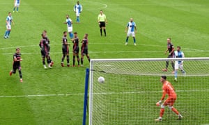 Adam Armstrong of Blackburn scores from a free-kick.