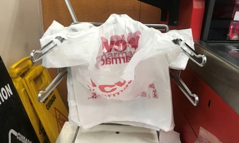 Pharmacy has plastic bags for distribution to customers in advance of ban, in Manhattan.