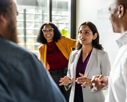 People talking in a modern conference room