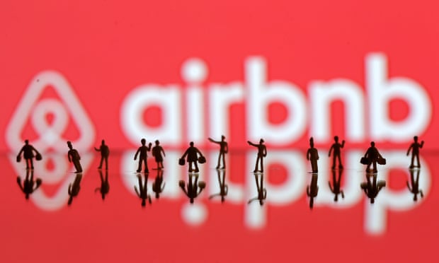A 3D printed people models is seen in front of a displayed Airbnb logo in this illustration taken, June 8, 2016. REUTERS/Dado Ruvic/Illustration TPX IMAGES OF THE DAY
