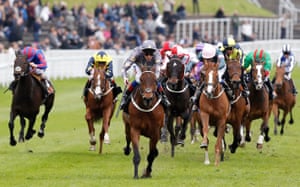 Magic Circle (centre), ridden by Fran Berry, powers home to win.