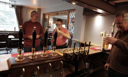 People try the beer in the Falcon Inn 