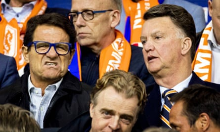 Fabio Capello and Louis van Gaal watch on in Amsterdam.