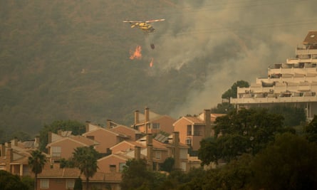 Helicopter above wildfire