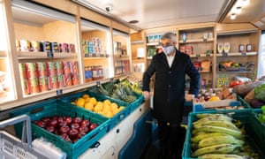 Sadiq Khan on the Wandsworth Food Bus at South Thames College in south-west London. The bus, which has just been launched and is described as the first of its kind, will sell nutritious, affordable food in areas of south London underserved by shops.