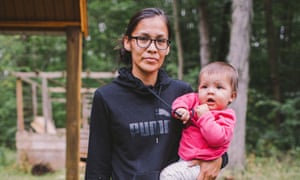 Lokarenhtha Thomas holds her daughter Waehsa Thomas.