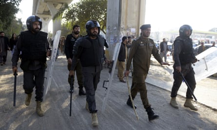 Police patrol amid protests in Rawalpindi on Sunday