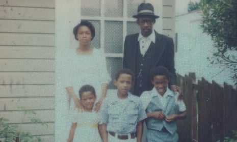 Sarah M Broom’s father, Simon, with her siblings outside their house at 4121 Wilson Avenue in 1977.