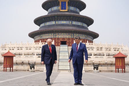 Trump walks with Xi at the Temple of Heaven.