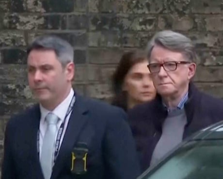 Britain Epstein MandelsonThis image taken from video made available by Sky News shows Peter Mandelson, right, escorted from a house to a car, in London, Monday Feb. 23, 2026. (Sky News via AP)