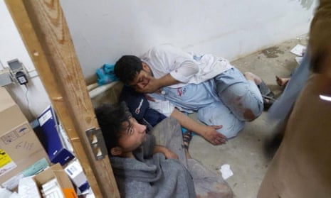 Injured Médecins Sans Frontières staff are seen after an airstrike struck their hospital in Kunduz.