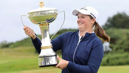 Lottie Woad lifts the Scottish Open trophy.