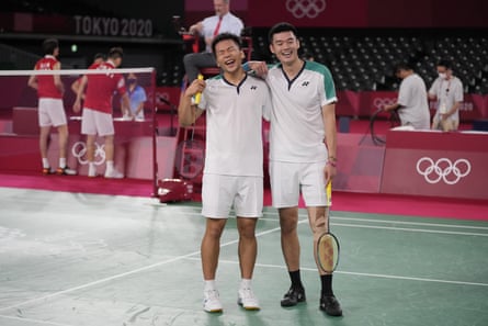 Taiwan’s Wang Chi-Lin, right, and Lee Yang celebrate.