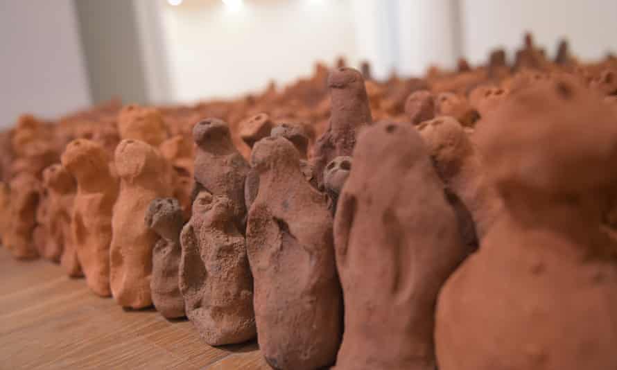 The terracotta figures were made by volunteers in Merseyside.