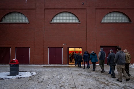 Voters line up to cast their ballots in the New Hampshire Primary at Pinkerton Academy in Derry, New Hampshire.