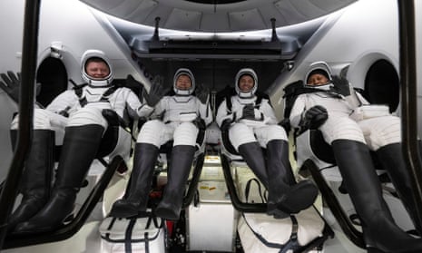 Russian cosmonaut Alexander Grebenkin (left) with US astronauts Michael Barratt, Matthew Dominick and Jeanette Epps on the SpaceX recovery ship