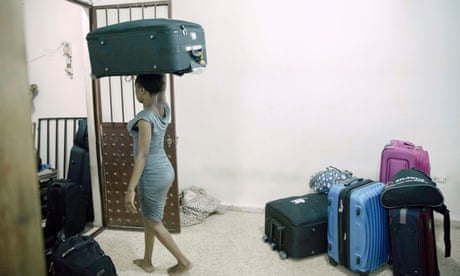 A former domestic migrant worker carries her luggage while packing for her repatriation on September 26, 2020 in Beirut, Lebanon. Migrant domestic workers in Lebanon are subjected to the kafala system, a private migration sponsorship system in Gulf countries which exponentially increases the risk of labour exploitation, forced labour and trafficking.