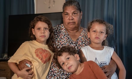 Kuku Yalanji elder Daphne Naden at her home in Mossman, Queensland, with her grandchildren