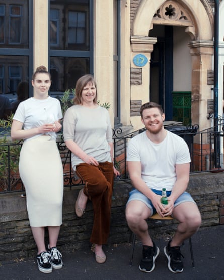 Manon Evans, Eva Trier and Greg Caine outside a house on Northumberland Street, Cardiff
