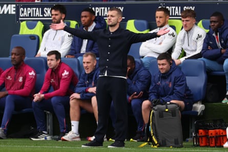 Jack Wilshere, the Luton manager, with arms outstretched during a game against Mansfield last season